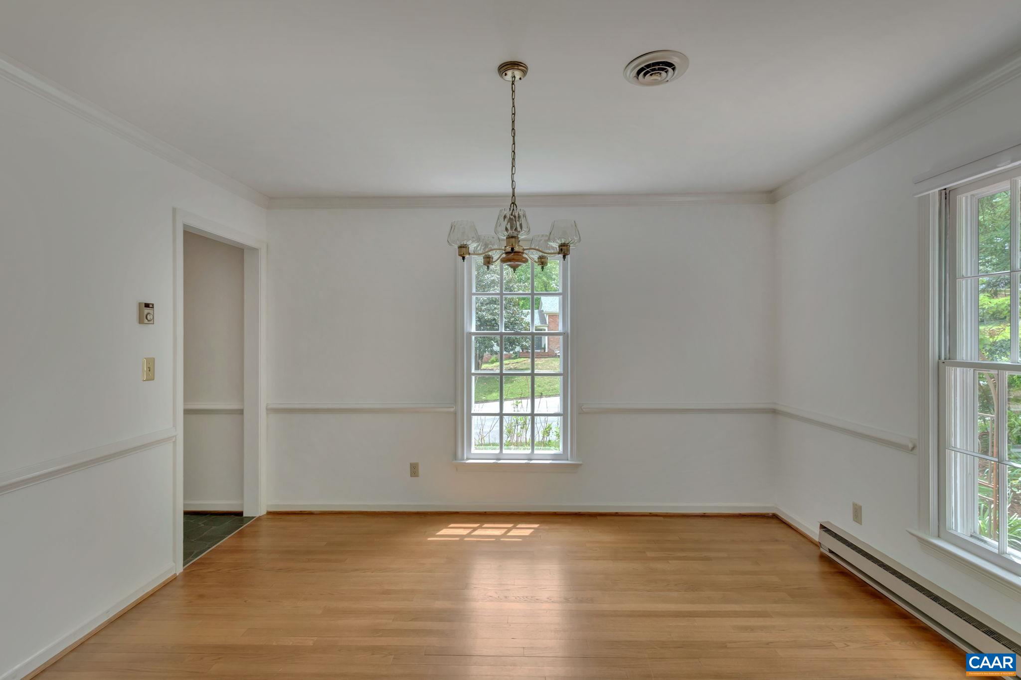 309 Westminster Road Charlottesville, VA 22901 - Photo 7 of 40 a view of an empty room with a window