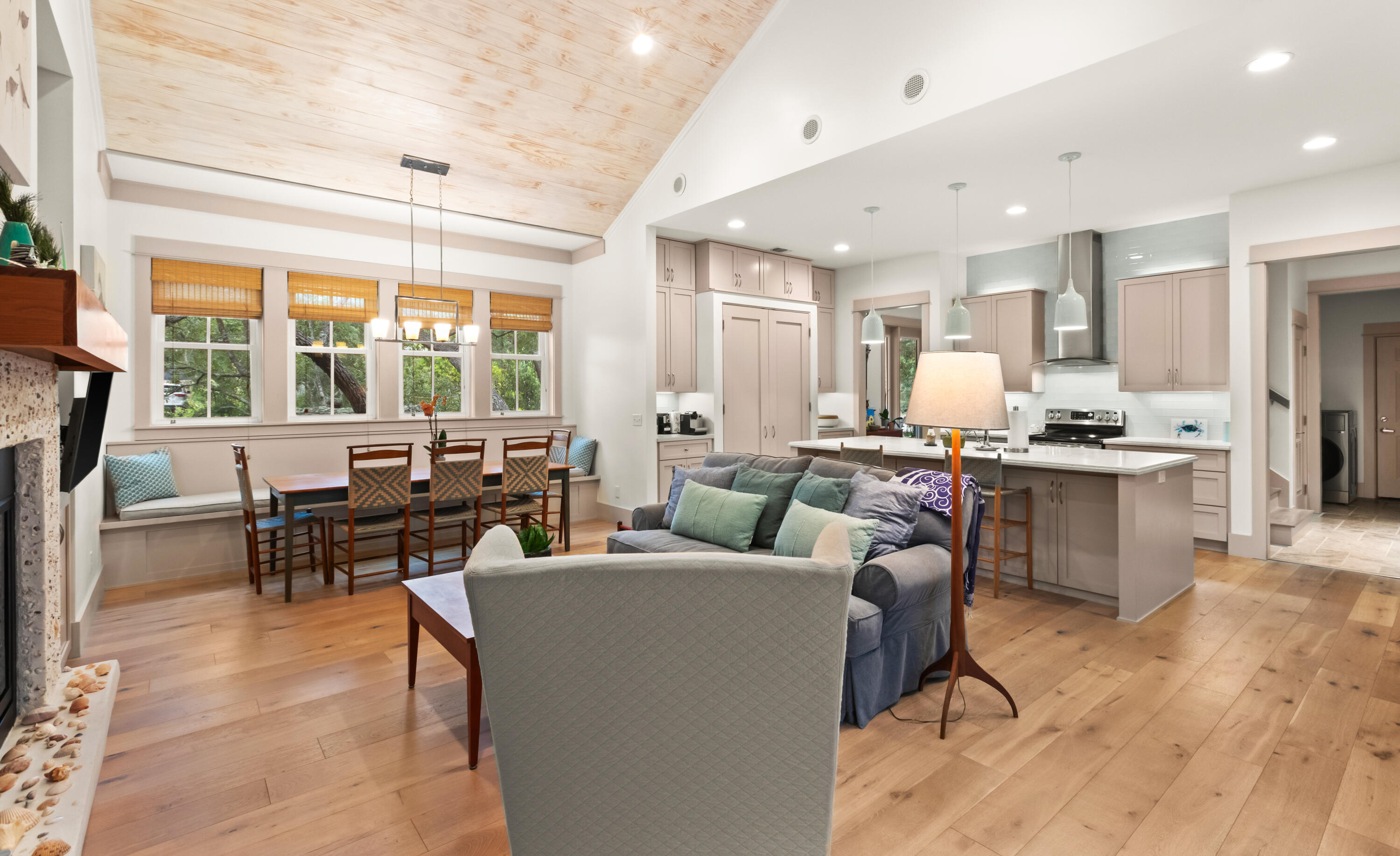 321 Seabreeze Boulevard Seacrest, FL 32461 - Photo 15 of 51 a living room with fireplace furniture and a large window