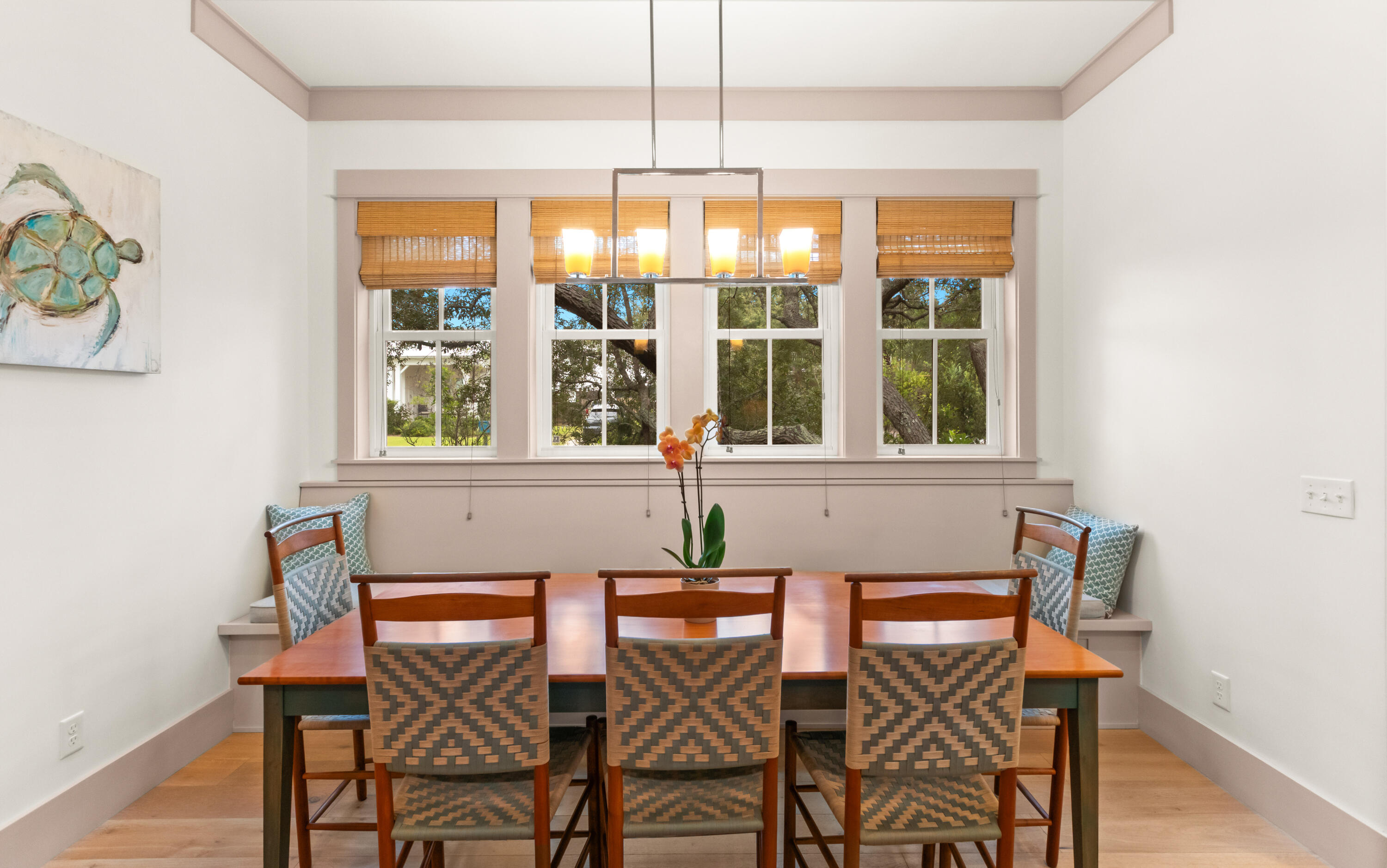 321 Seabreeze Boulevard Seacrest, FL 32461 - Photo 17 of 51 a view of a dining room with furniture and chandelier