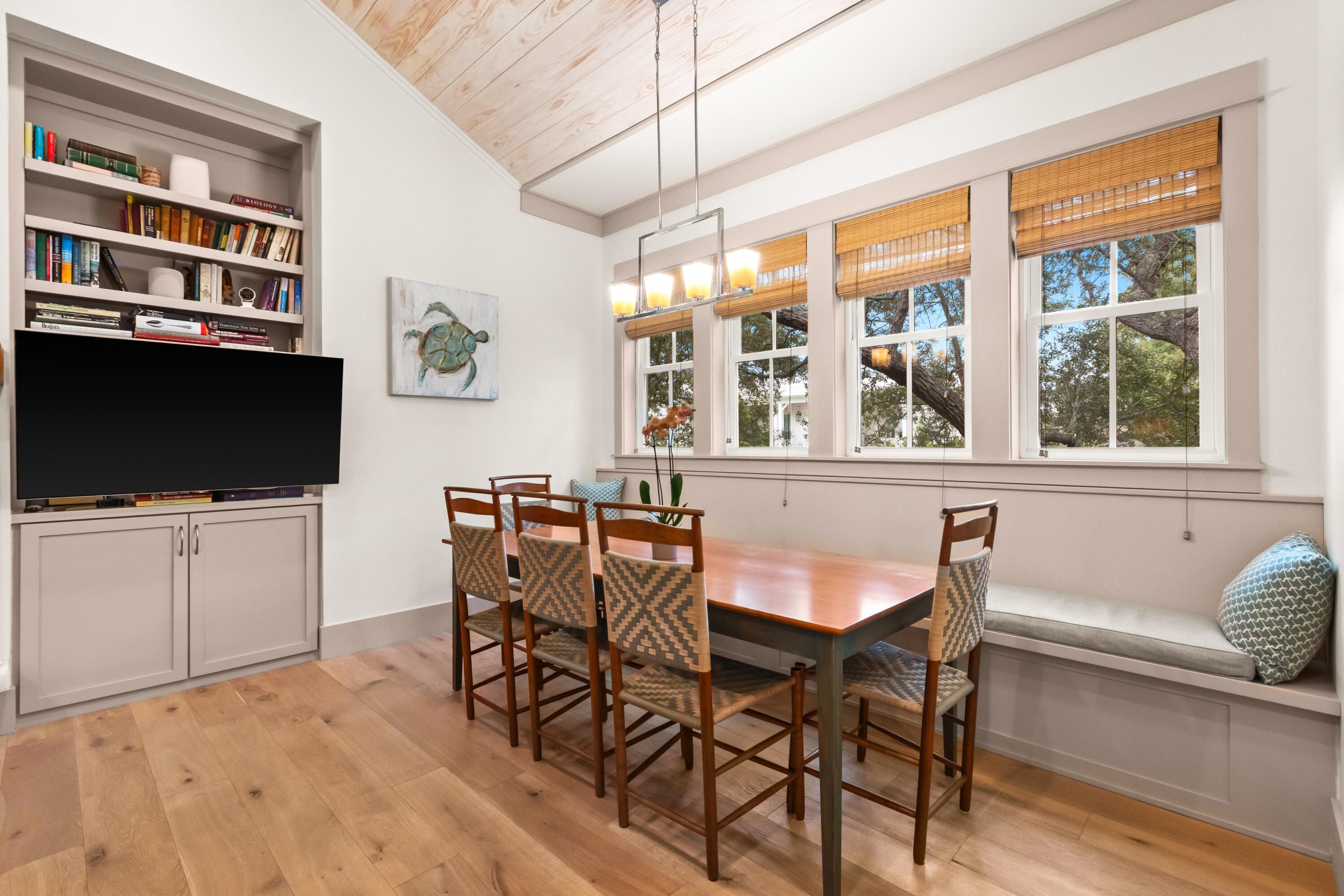 321 Seabreeze Boulevard Seacrest, FL 32461 - Photo 18 of 51 a view of a livingroom with furniture flat screen tv and windows