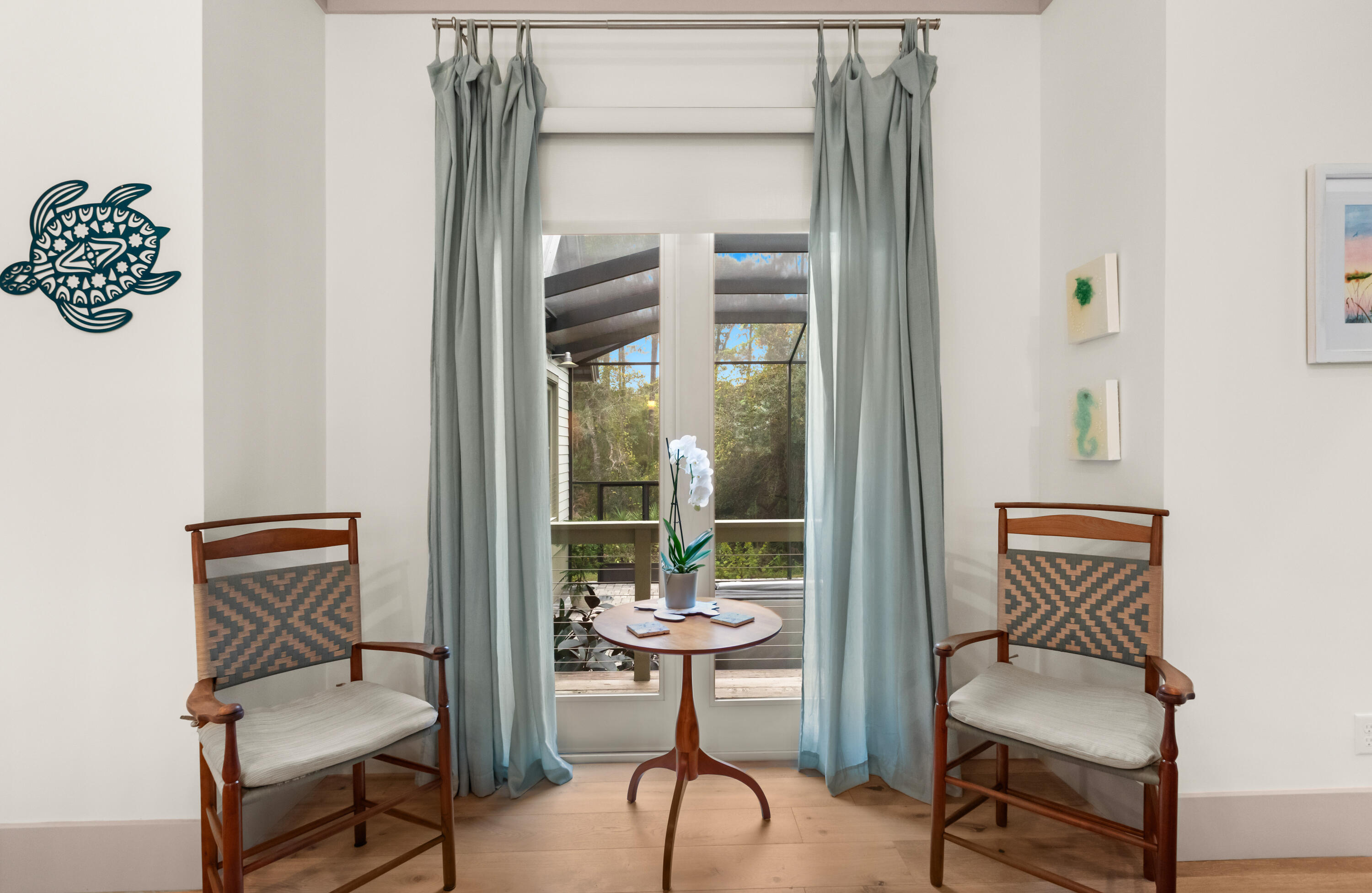 321 Seabreeze Boulevard Seacrest, FL 32461 - Photo 19 of 51 a view of a hallway with furniture and lamp