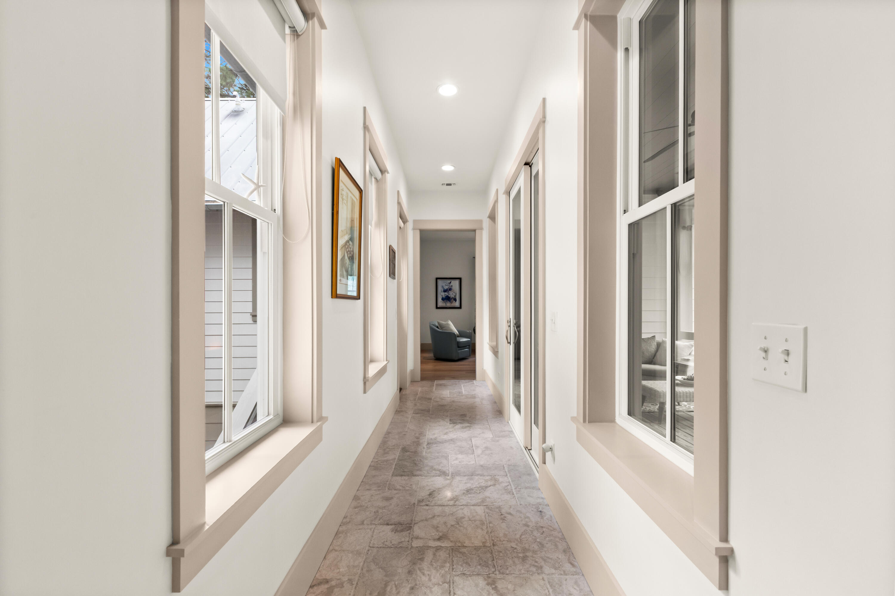 321 Seabreeze Boulevard Seacrest, FL 32461 - Photo 21 of 51 a view of a hallway with wooden floor and staircase