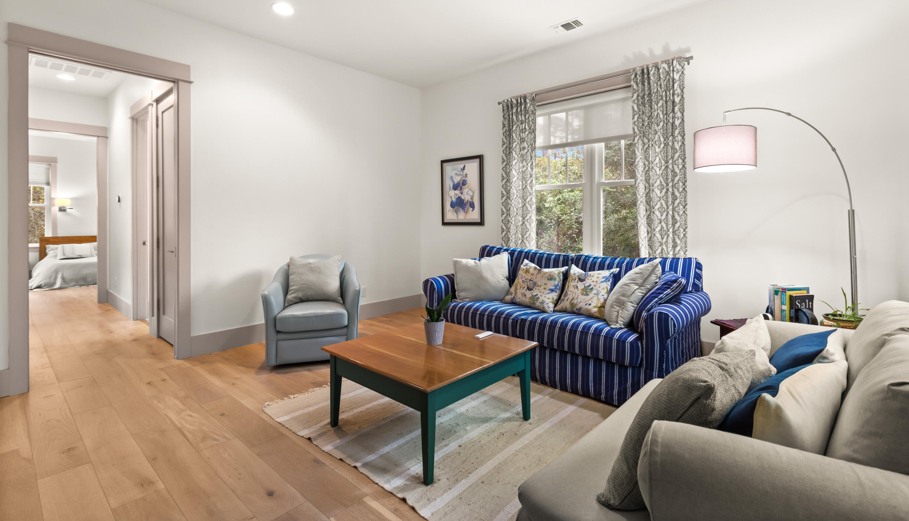 321 Seabreeze Boulevard Seacrest, FL 32461 - Photo 24 of 51 a living room with furniture and a window