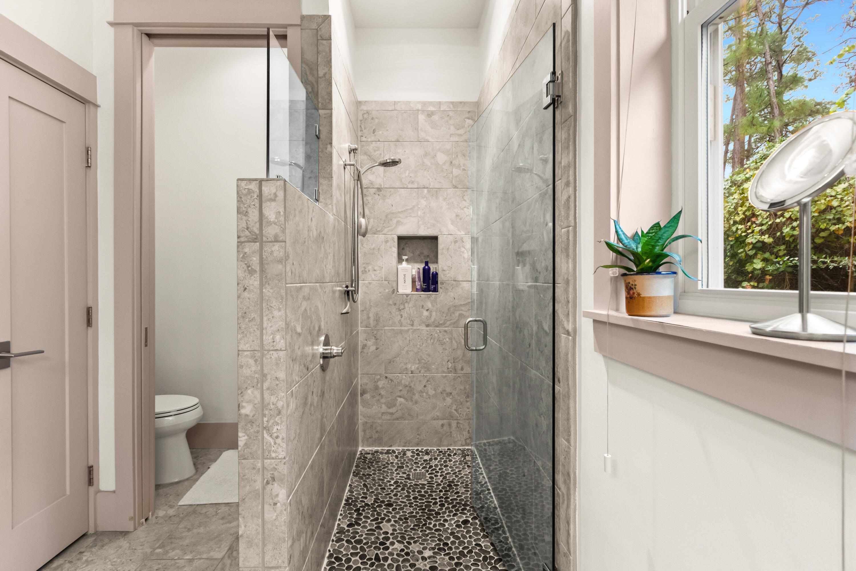 321 Seabreeze Boulevard Seacrest, FL 32461 - Photo 27 of 51 a bathroom with a granite countertop sink a toilet and shower