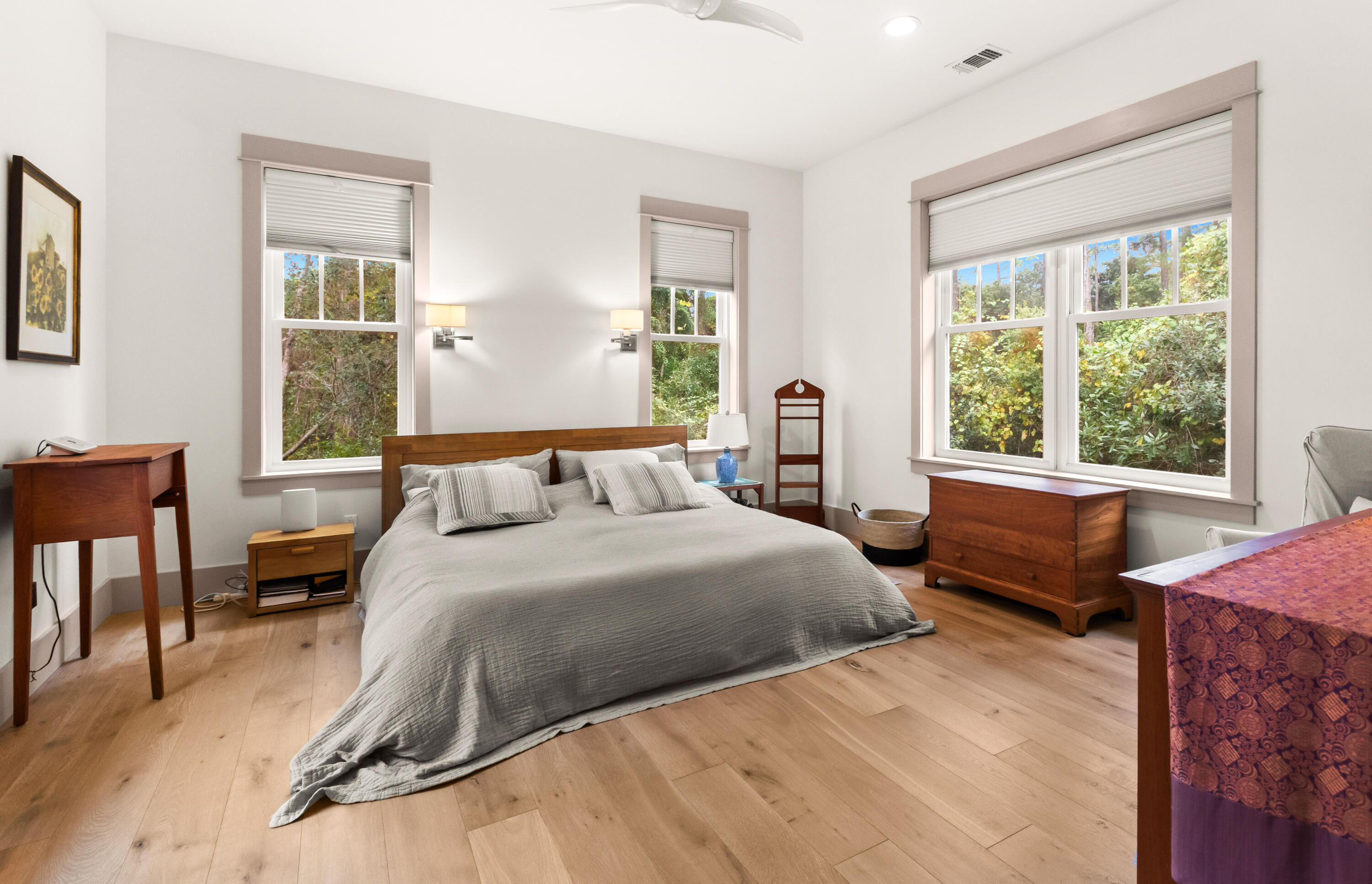 321 Seabreeze Boulevard Seacrest, FL 32461 - Photo 28 of 51 a bedroom with a bed and a couch next to a window