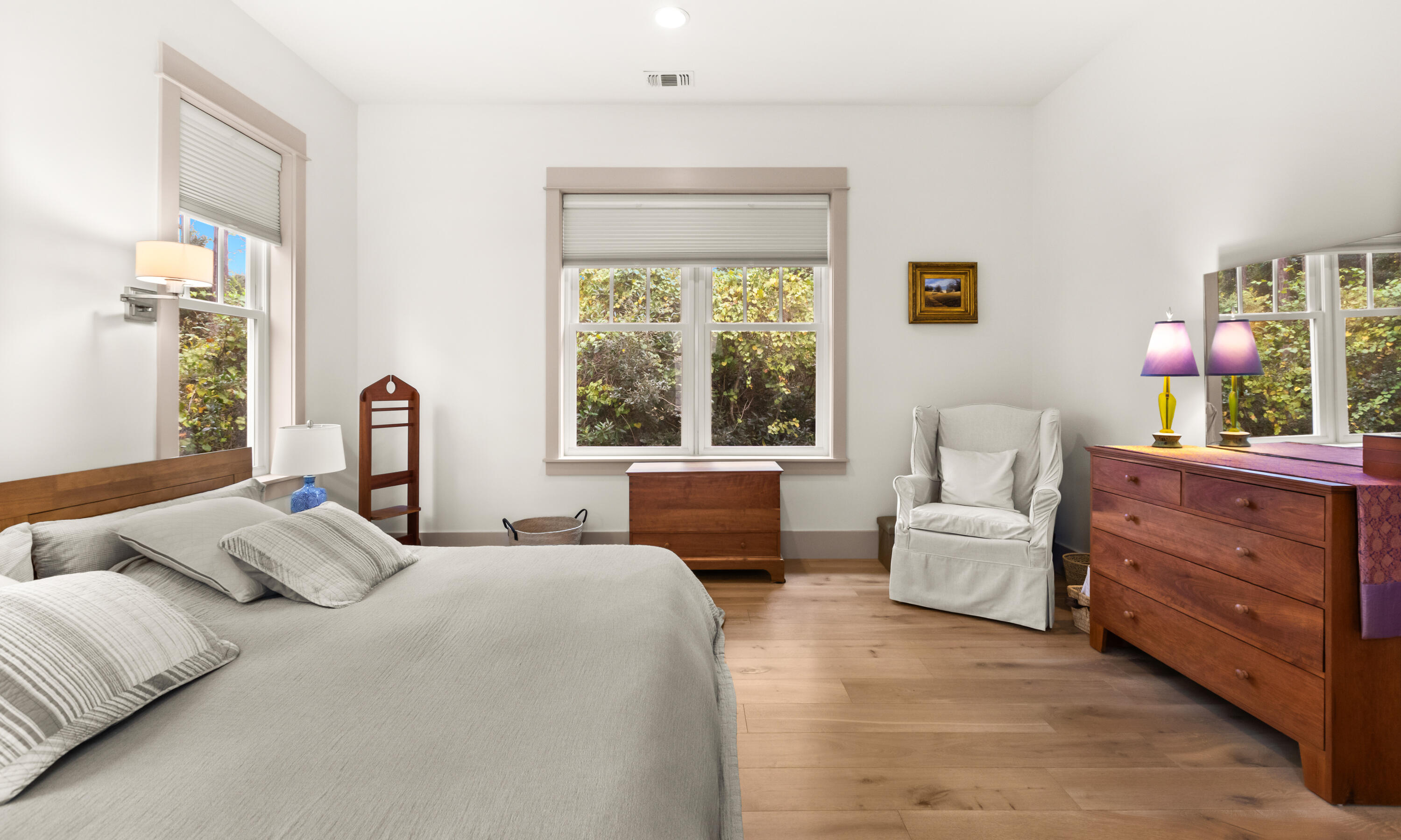 321 Seabreeze Boulevard Seacrest, FL 32461 - Photo 32 of 51 a bedroom with a bed and wooden floor