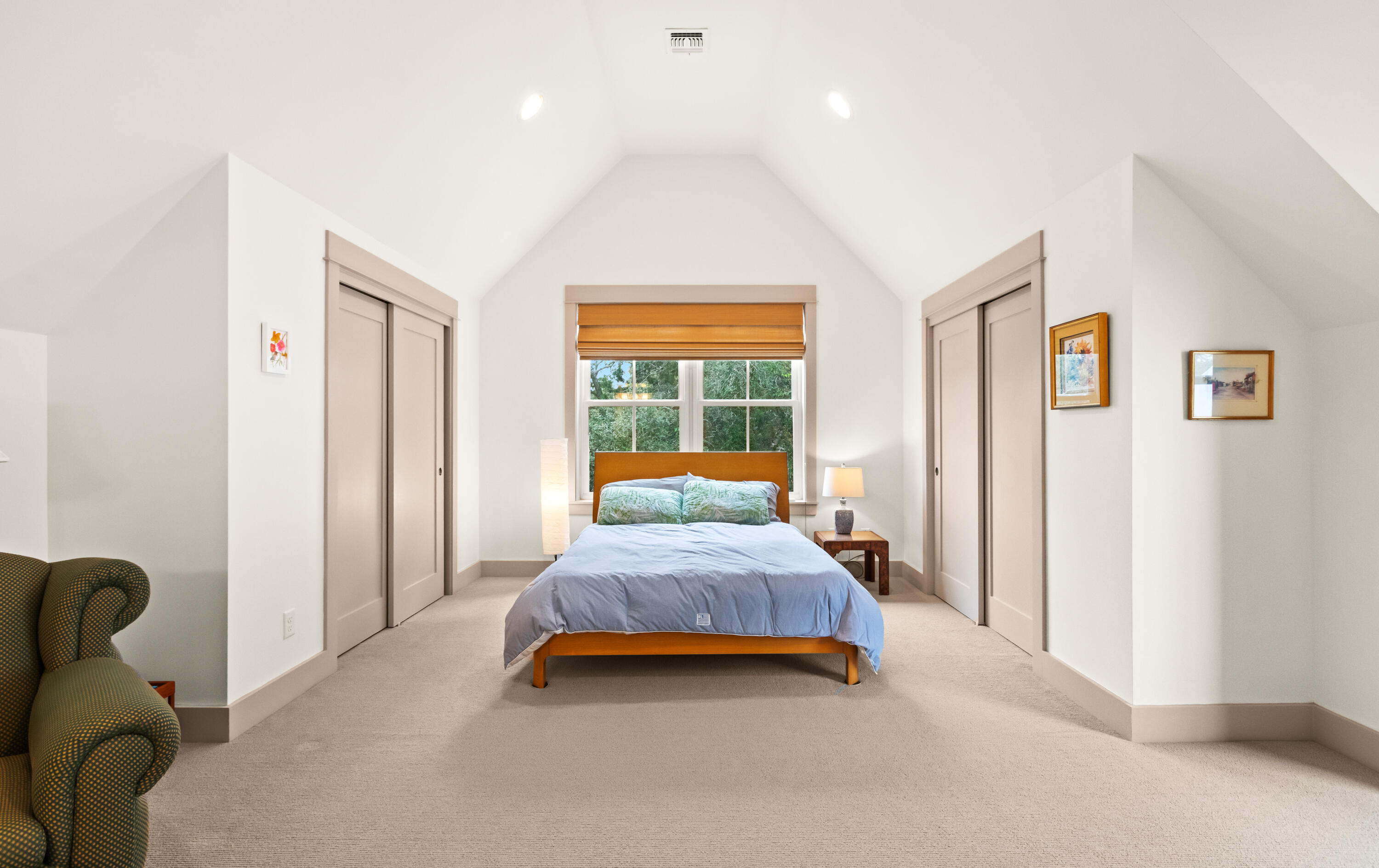 321 Seabreeze Boulevard Seacrest, FL 32461 - Photo 38 of 51 a bedroom with a bed and wooden floor