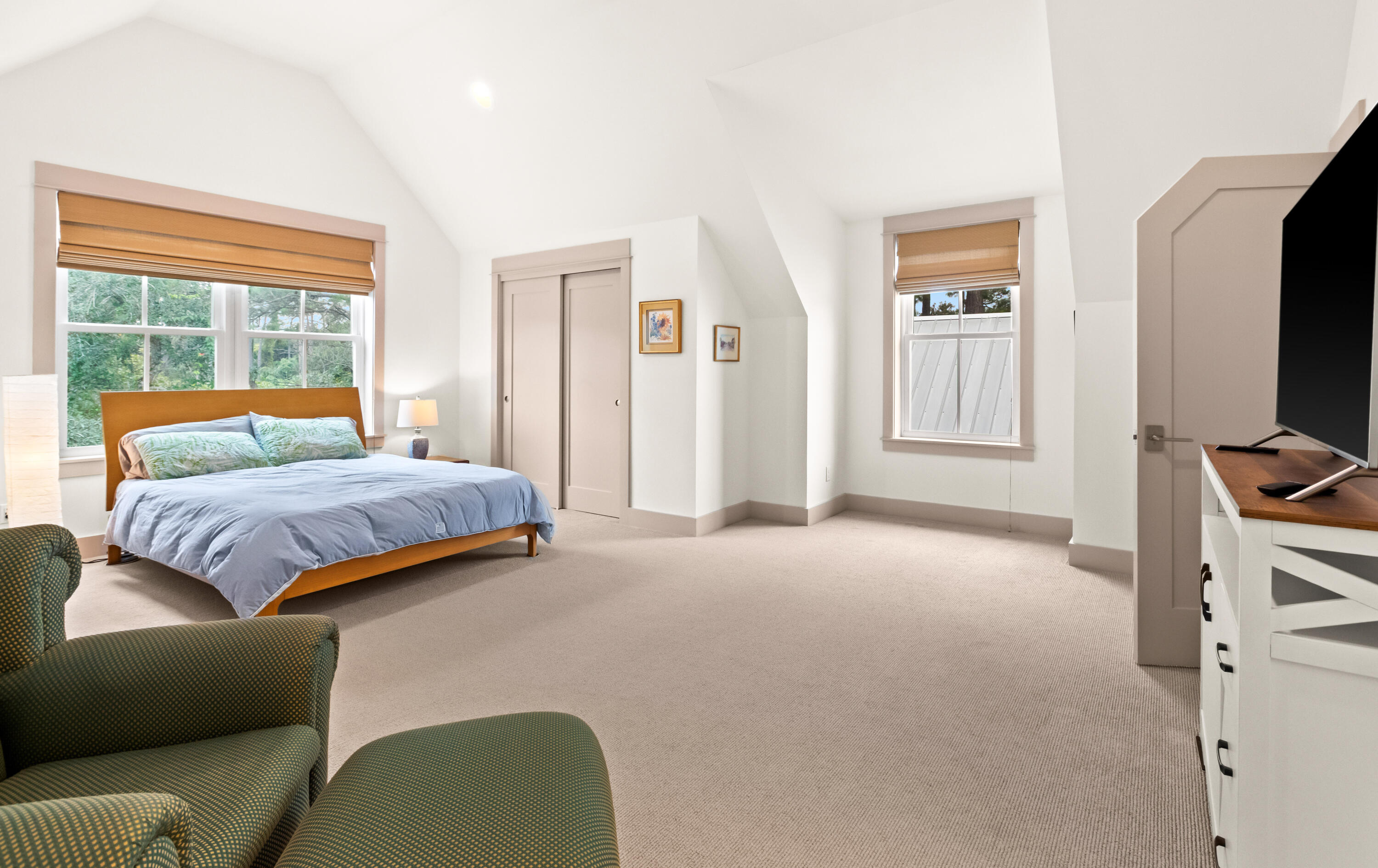 321 Seabreeze Boulevard Seacrest, FL 32461 - Photo 39 of 51 a bedroom with furniture and a flat screen tv