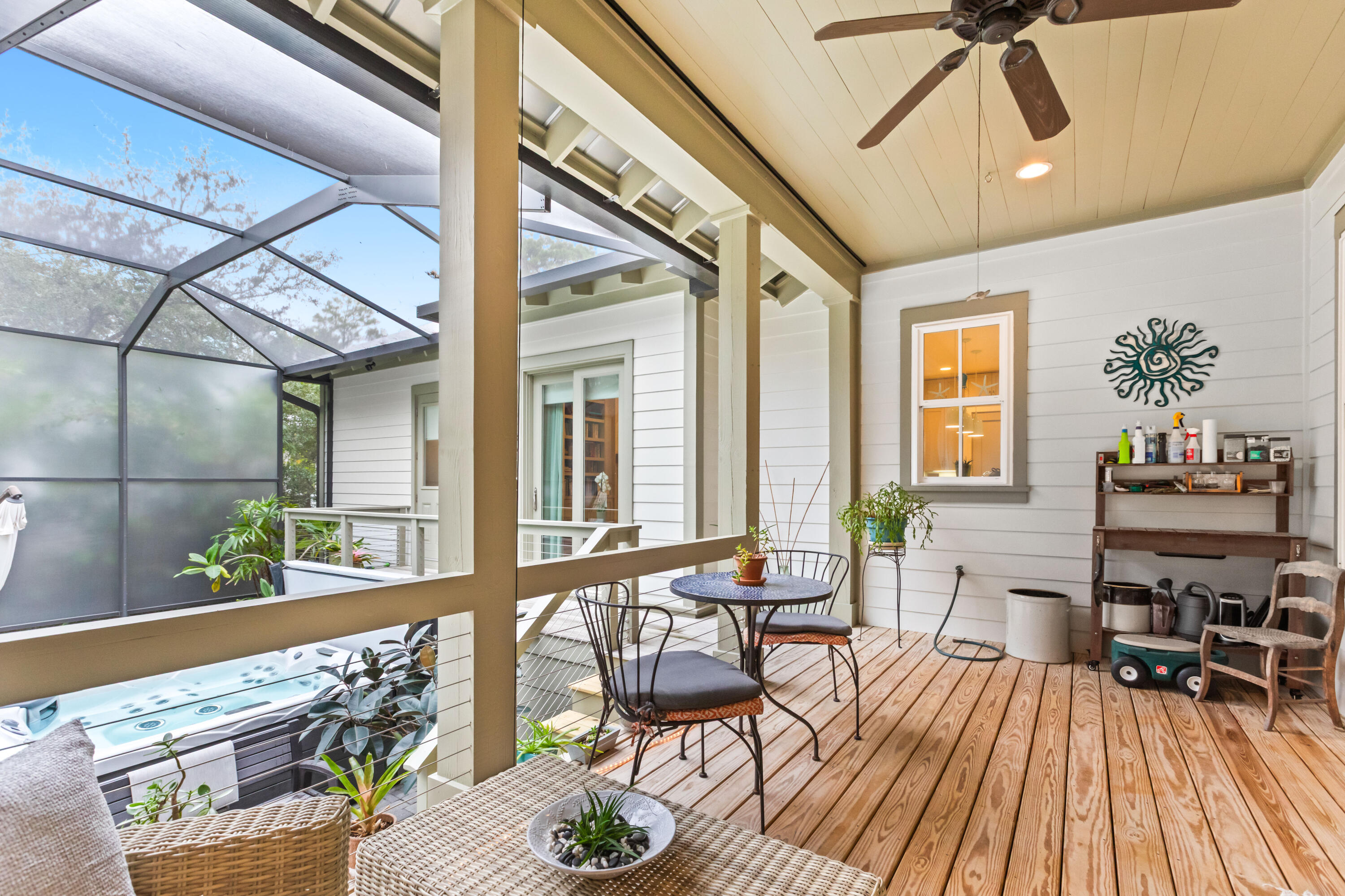 321 Seabreeze Boulevard Seacrest, FL 32461 - Photo 48 of 51 a balcony with furniture and wooden floor