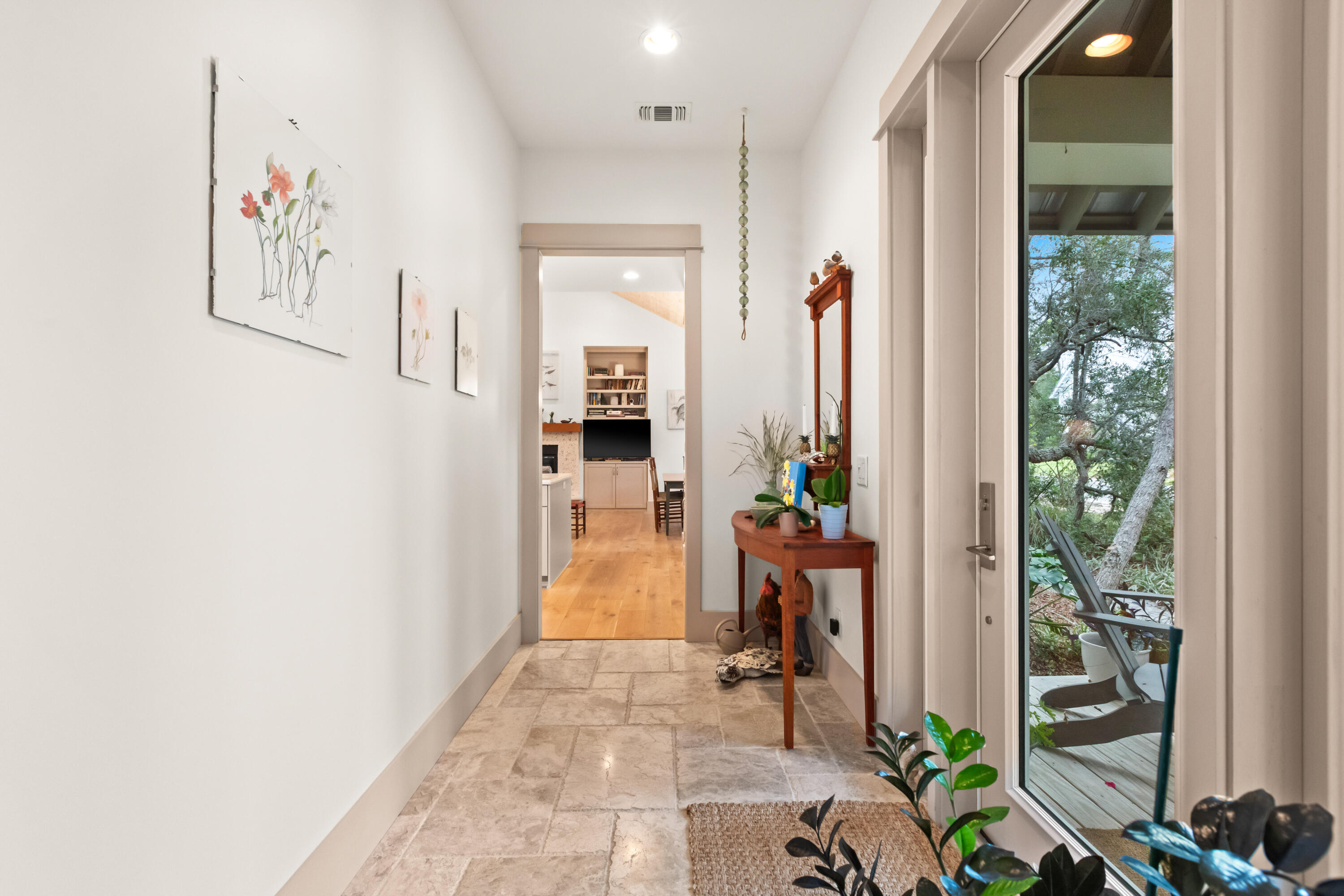 321 Seabreeze Boulevard Seacrest, FL 32461 - Photo 6 of 51 a view of hallway with furniture and floor to ceiling window