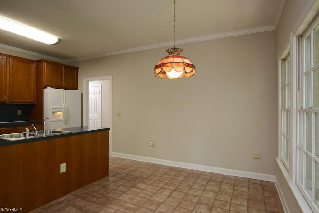 918 Flicker Lane High Point, NC 27262 - Photo 13 of 27 Tile floor makes clean up of spills easy