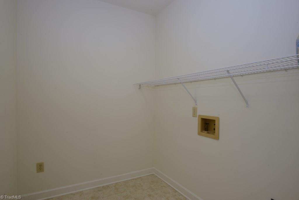 918 Flicker Lane High Point, NC 27262 - Photo 18 of 27 Laundry room is located off the master bedroom