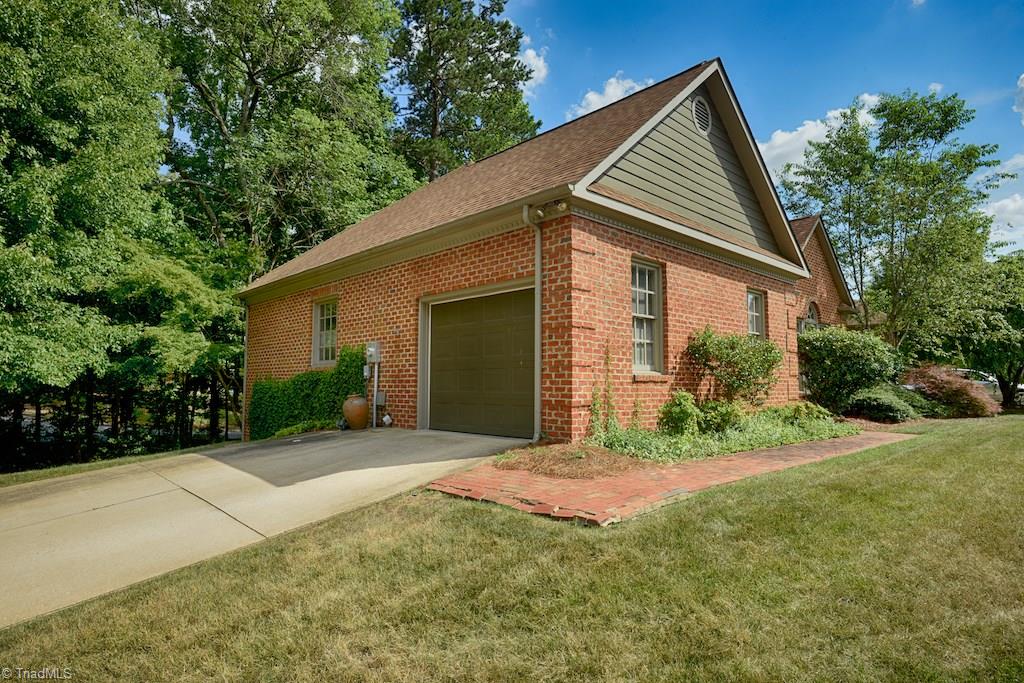 918 Flicker Lane High Point, NC 27262 - Photo 3 of 27 Side View of home the one car garage with terrific storage