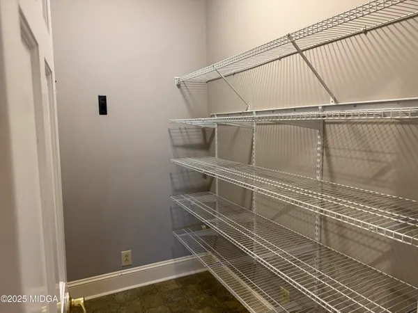 a view of a room with rack on the wall