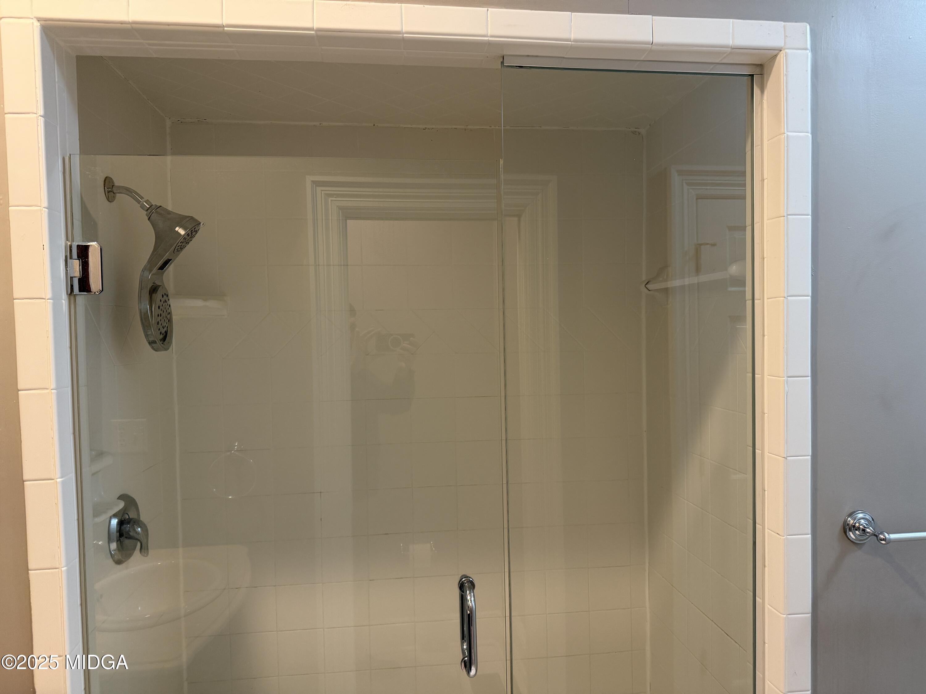 175 Corbin Avenue, Unit A Macon, GA 31204 - Photo 9 of 15 a bathroom with a shower