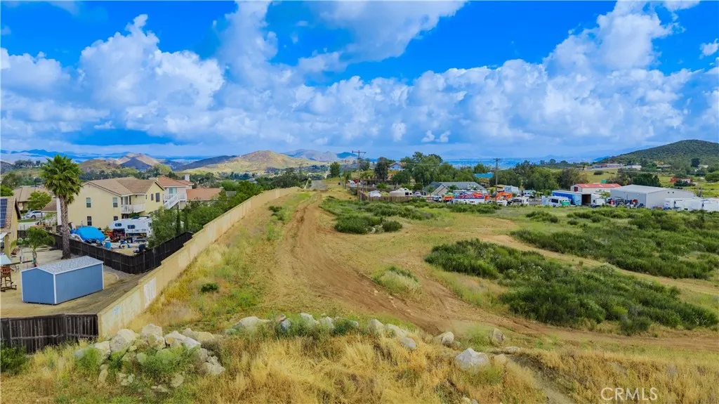 1 Sunset Wildomar, CA 92595 - Photo 33 of 44 a view of a multi story residential apartment building with a yard