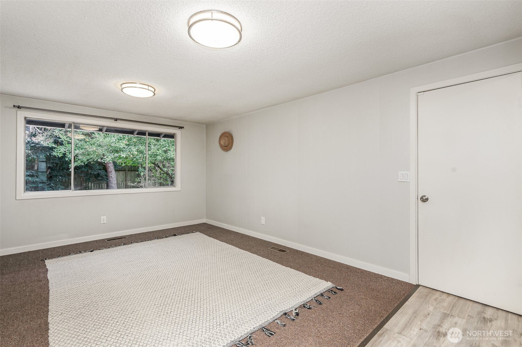 11804 Southeast 165th Street Renton, WA 98058 - Photo 20 of 28 an empty room with a window