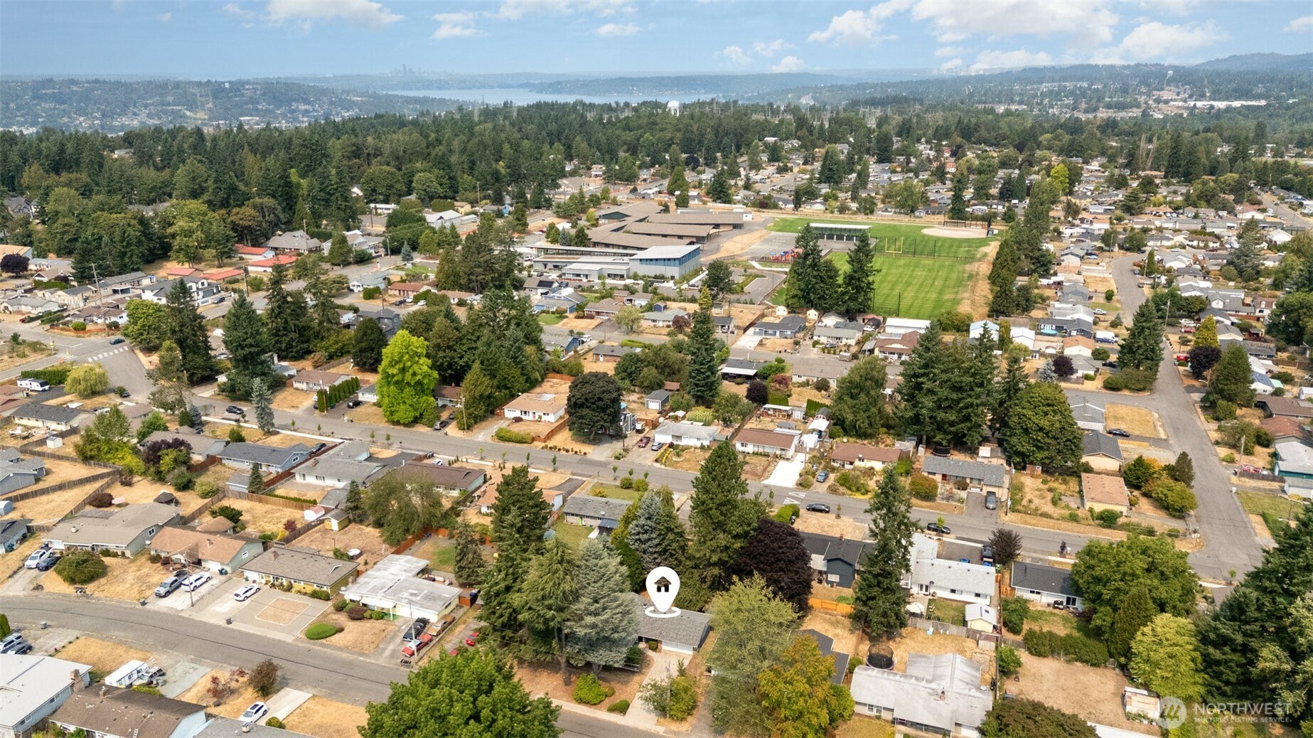 11804 Southeast 165th Street Renton, WA 98058 - Photo 27 of 28 a view of a city with mountains in the background