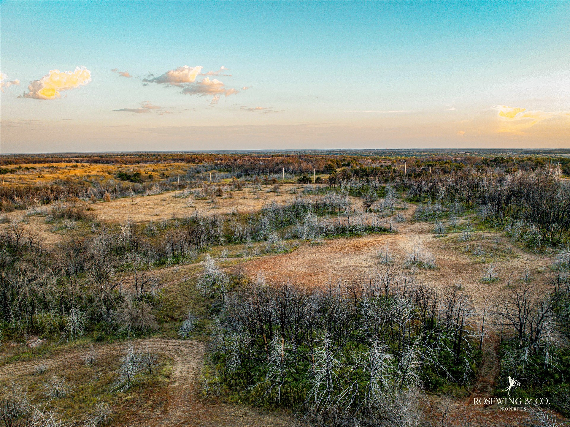 Seward Road East Meridian, OK 73058 - Photo 15 of 26 Expansive acreage featuring varied terrain, natural tree coverage, and open clearings