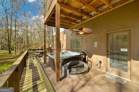 a view of swimming pool with seating area
