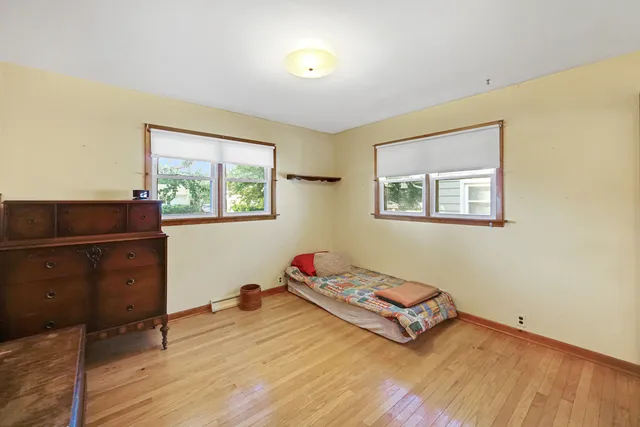 a bathroom with a sink toilet tub and shower