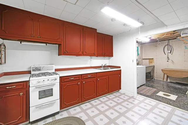 a view of a kitchen with a sink
