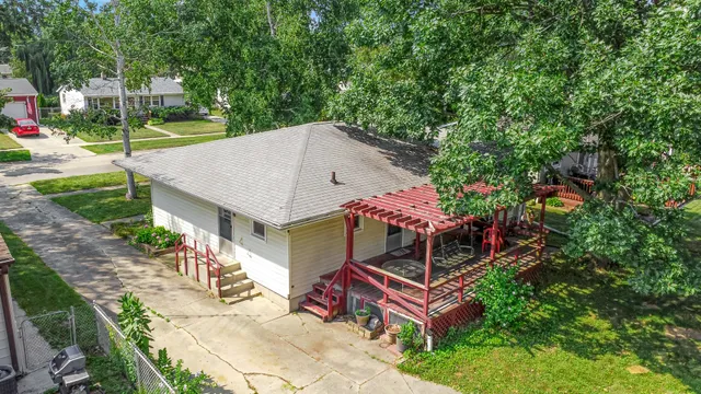 an outdoor space with seating area and garden