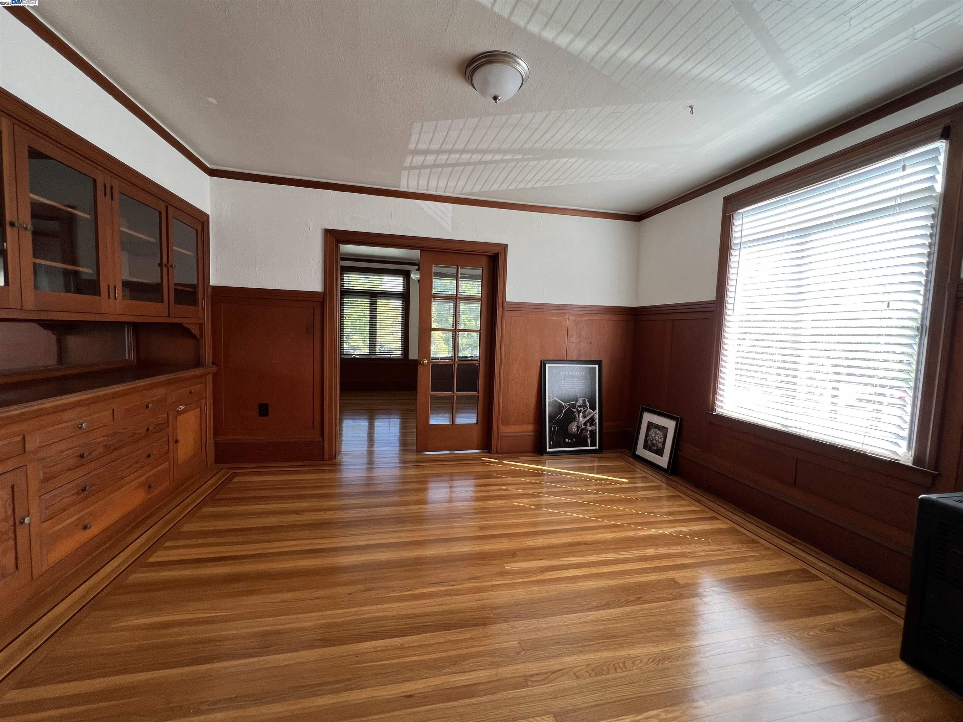 1301 9th Street Alameda, CA 94501 - Photo 6 of 12 a view of an empty room with window and fire place