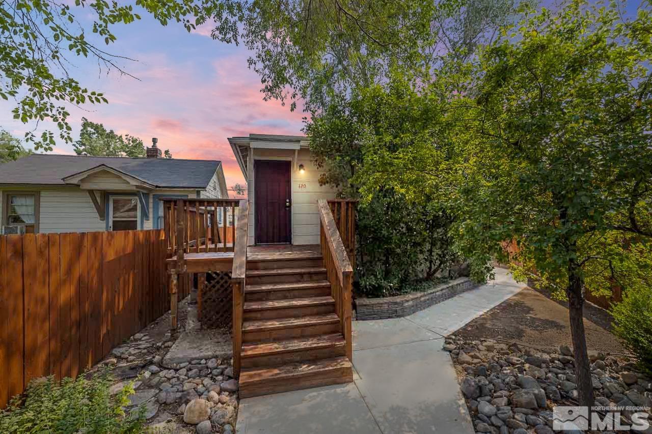 120 Caliente Street Reno, NV 89509 - Photo 1 of 20 a view of house with outdoor space and trees