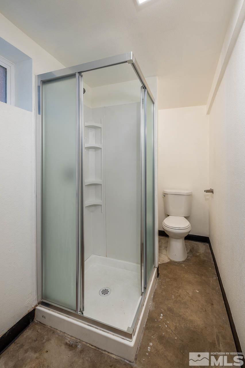 120 Caliente Street Reno, NV 89509 - Photo 17 of 20 a bathroom with a shower and a toilet