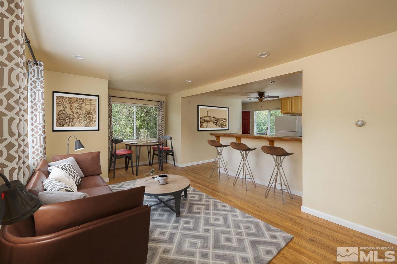 120 Caliente Street Reno, NV 89509 - Photo 6 of 20 a living room with furniture and a wooden floor