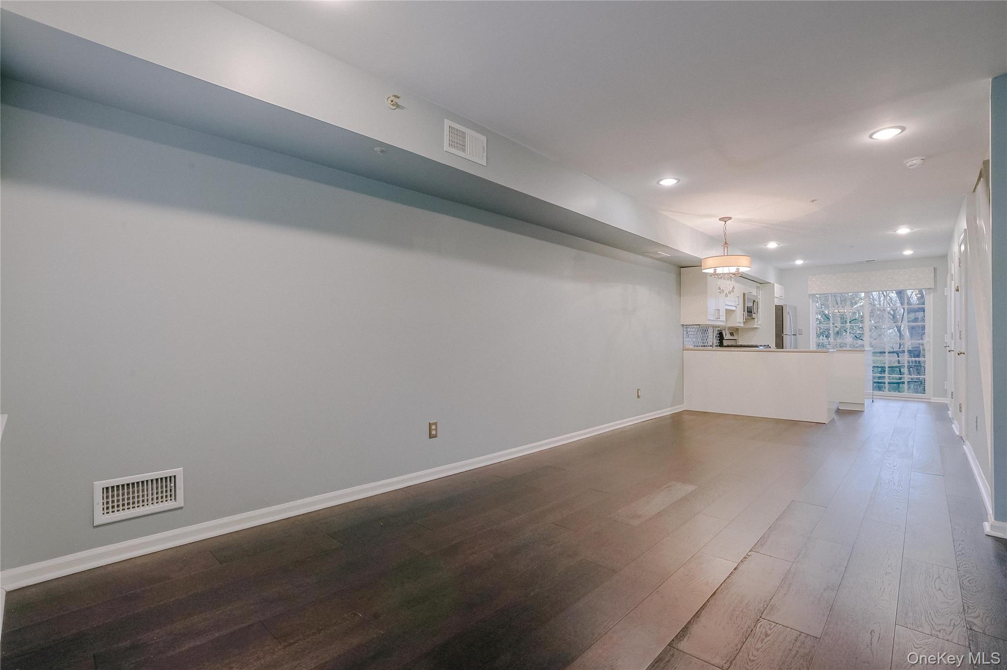 203 Park Ridge Lane White Plains, NY 10603 - Photo 23 of 30 a view of a kitchen with wooden floor and a sink