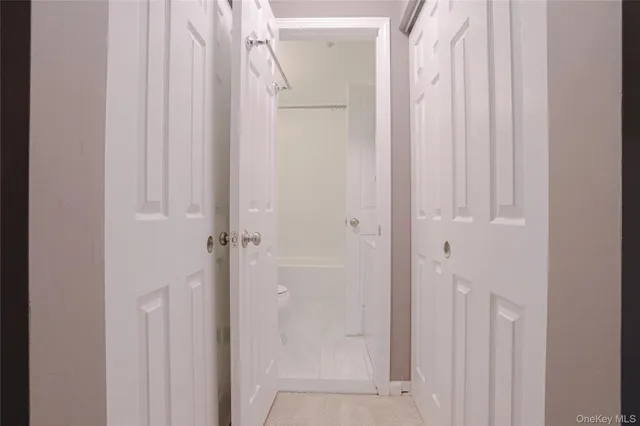 a view of staircase with white walls and white walls