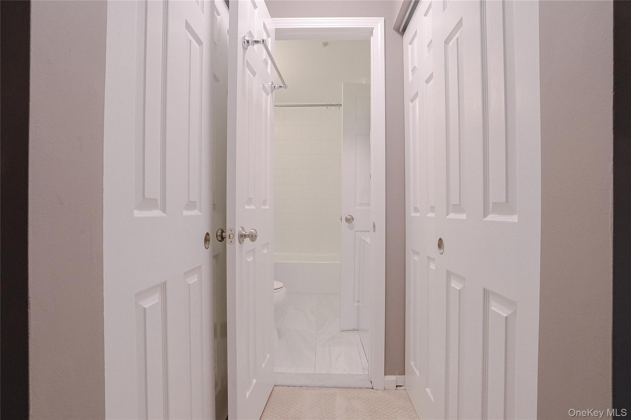 203 Park Ridge Lane White Plains, NY 10603 - Photo 10 of 30 a bathroom with a glass shower door