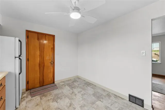 a bathroom with a sink toilet and mirror