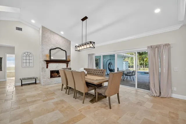 a bedroom with a bed a couch and dresser