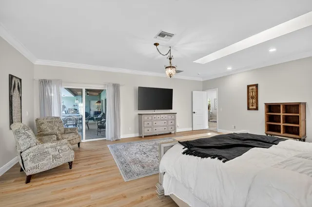 a bathroom with a shower a toilet and a sink