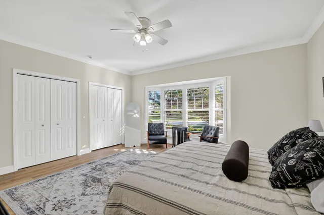 a view of a livingroom with furniture and a potted plant