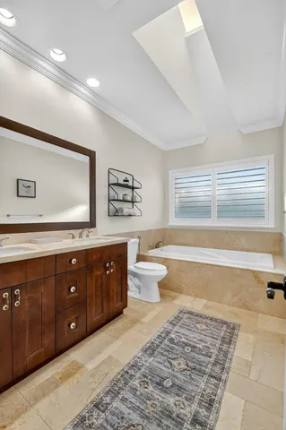 a view of a house with swimming pool and sitting area