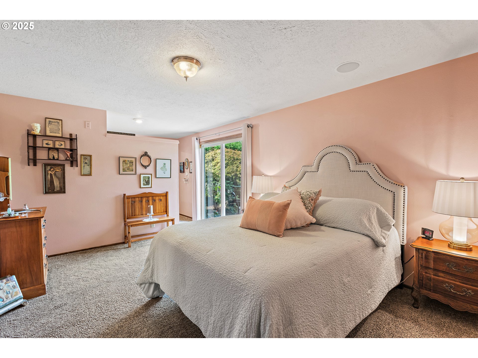 1754 Springtime Court Northeast Keizer, OR 97303 - Photo 14 of 35 a bedroom with a bed and a large window