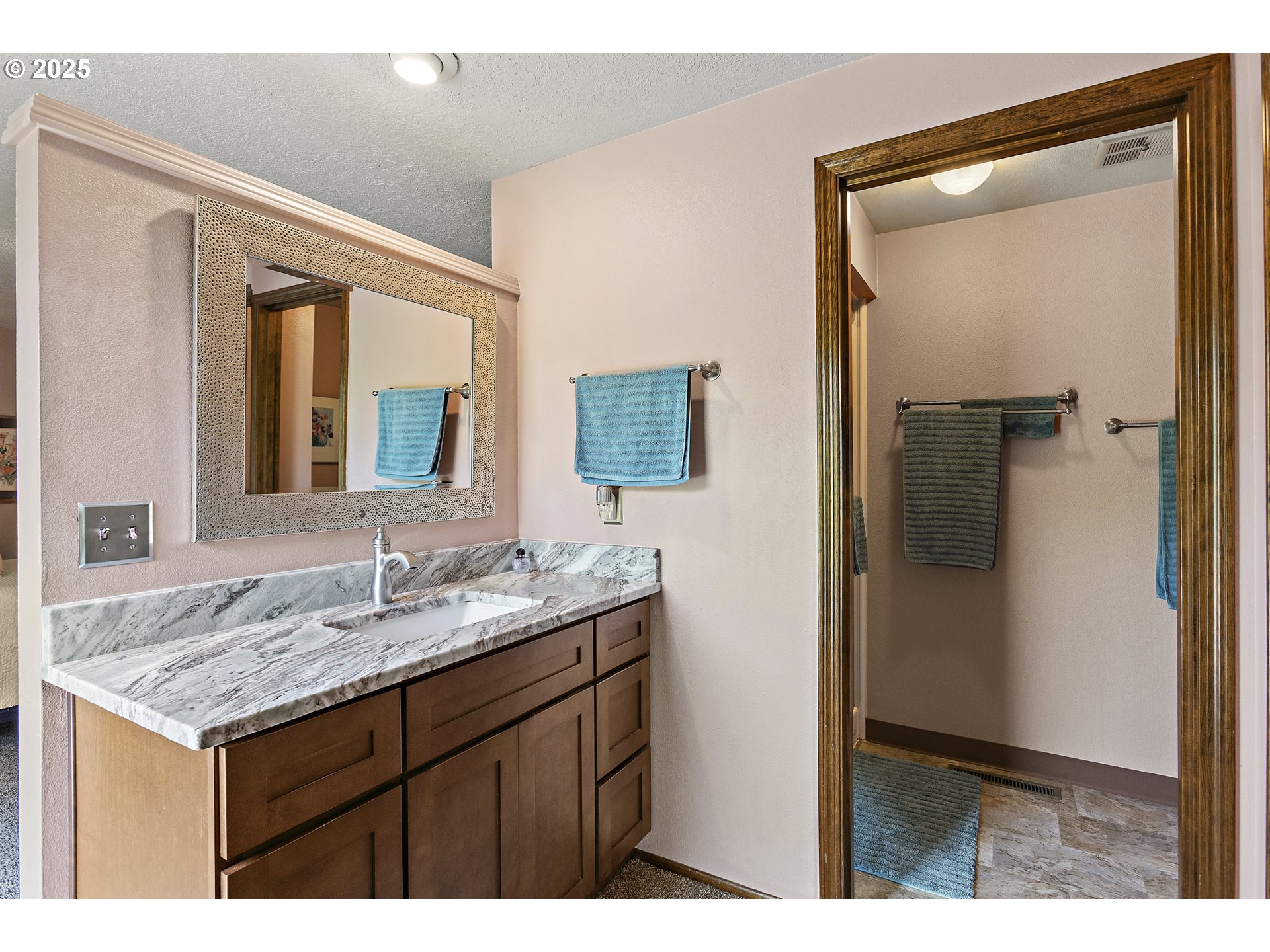 1754 Springtime Court Northeast Keizer, OR 97303 - Photo 17 of 35 a bathroom with a granite countertop sink and a mirror