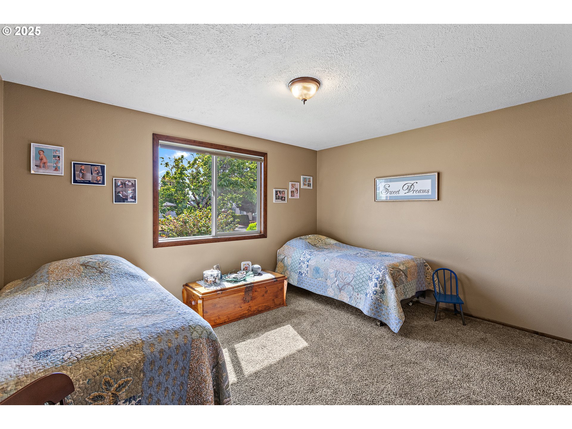 1754 Springtime Court Northeast Keizer, OR 97303 - Photo 19 of 35 a bedroom with a bed and a window