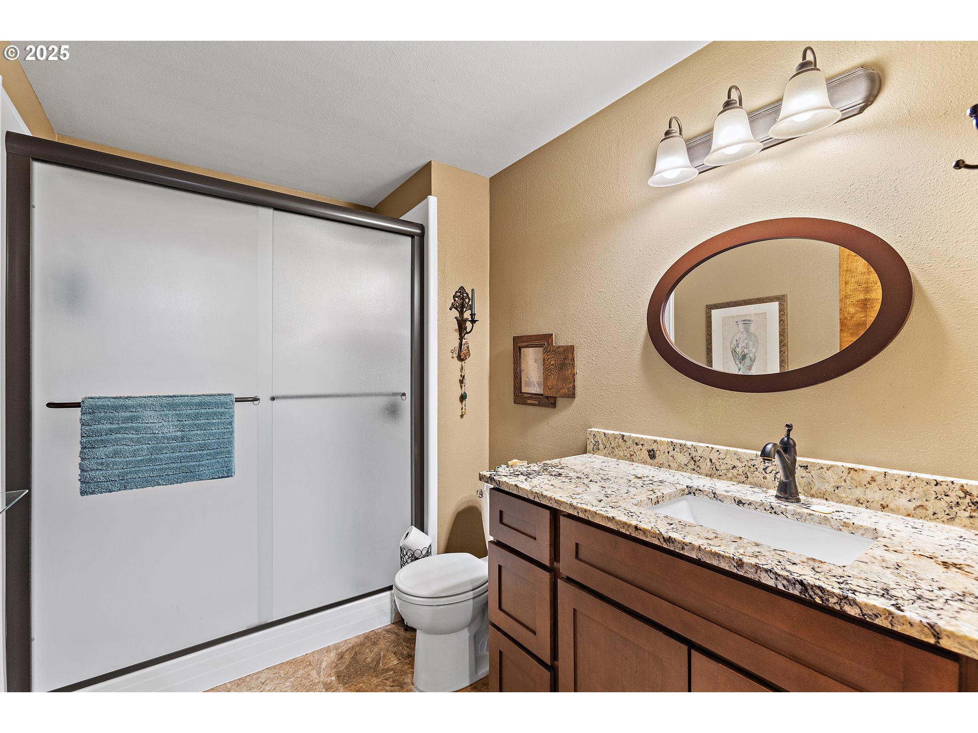 1754 Springtime Court Northeast Keizer, OR 97303 - Photo 22 of 35 a bathroom with a granite countertop sink toilet and a mirror