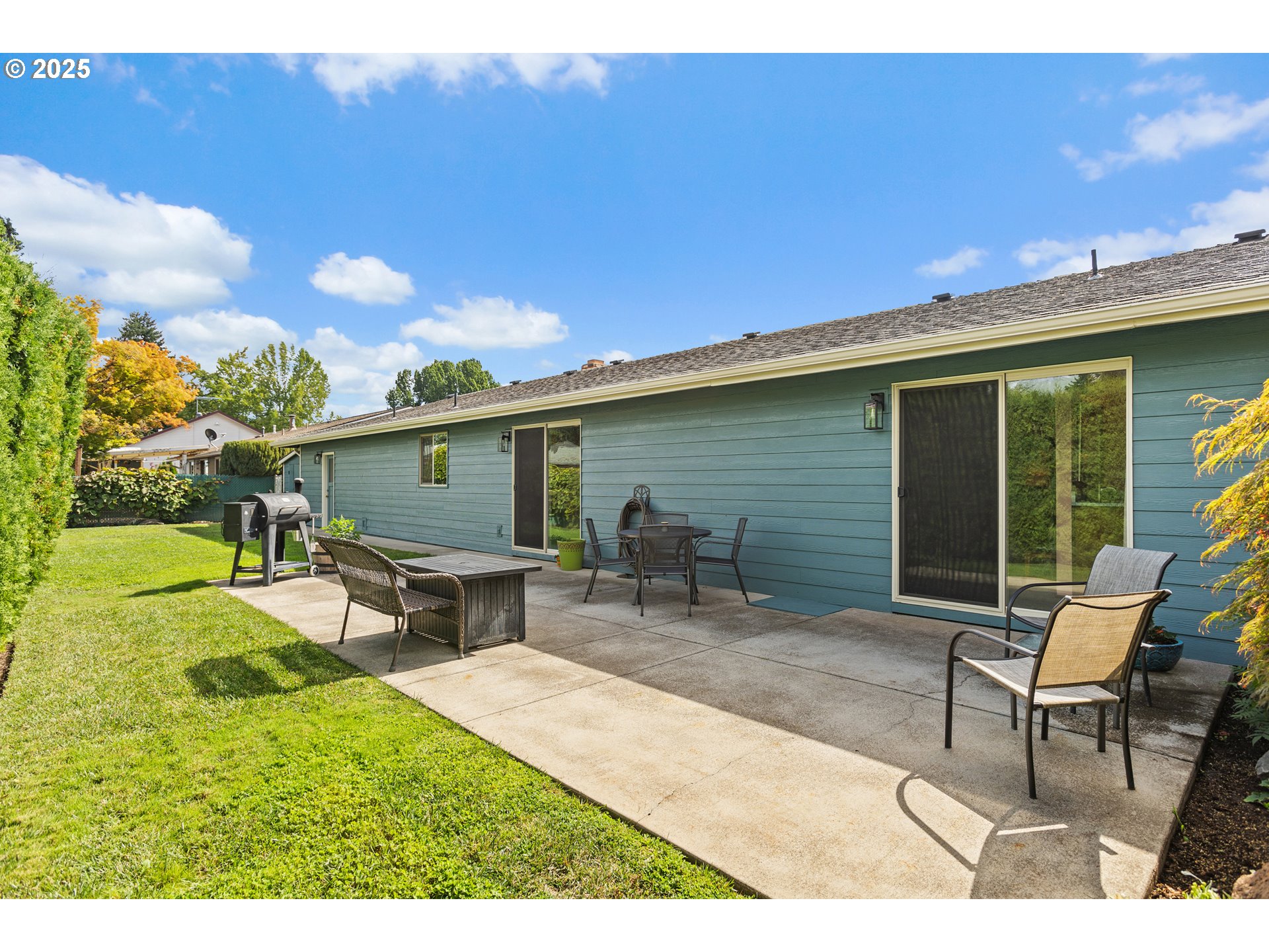 1754 Springtime Court Northeast Keizer, OR 97303 - Photo 24 of 35 a backyard of a house with table and chairs