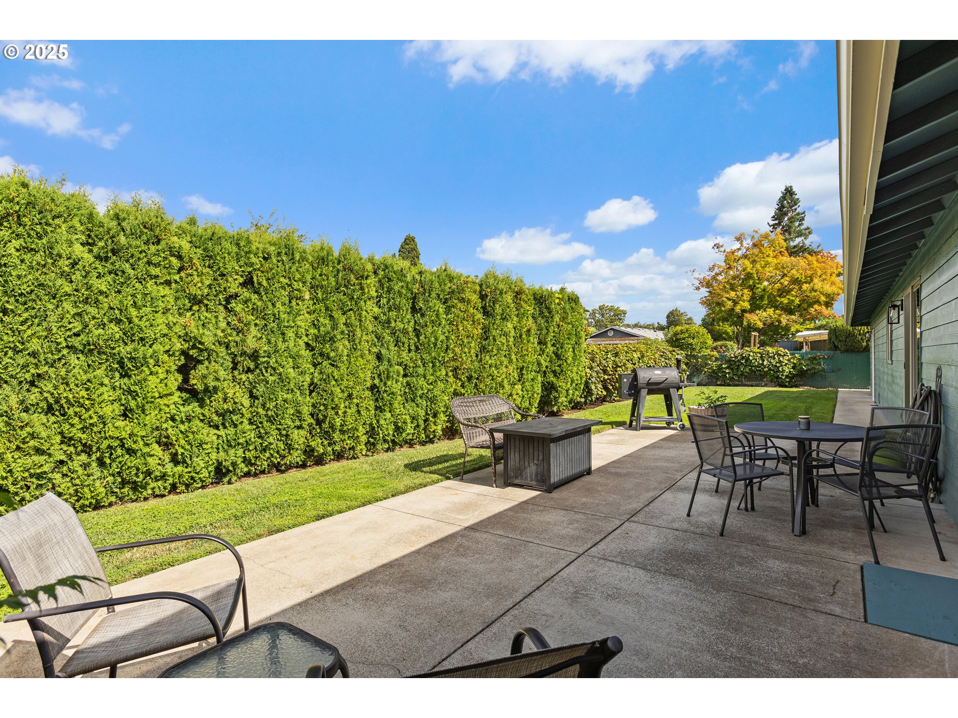 1754 Springtime Court Northeast Keizer, OR 97303 - Photo 25 of 35 a view of a chairs and table in the patio