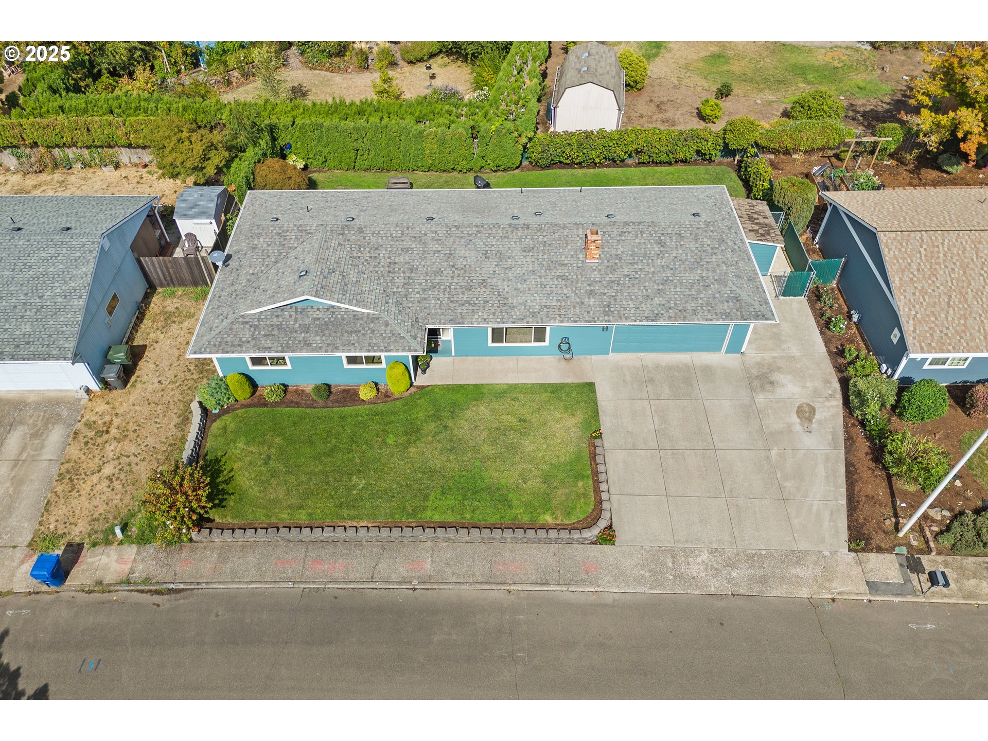 1754 Springtime Court Northeast Keizer, OR 97303 - Photo 32 of 35 an aerial view of a house with a yard