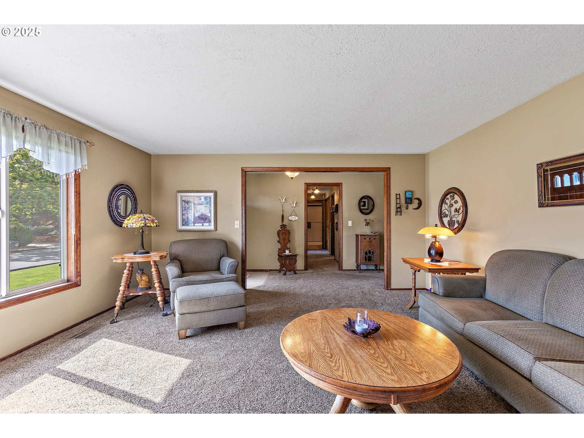 1754 Springtime Court Northeast Keizer, OR 97303 - Photo 6 of 35 a living room with furniture and a fireplace
