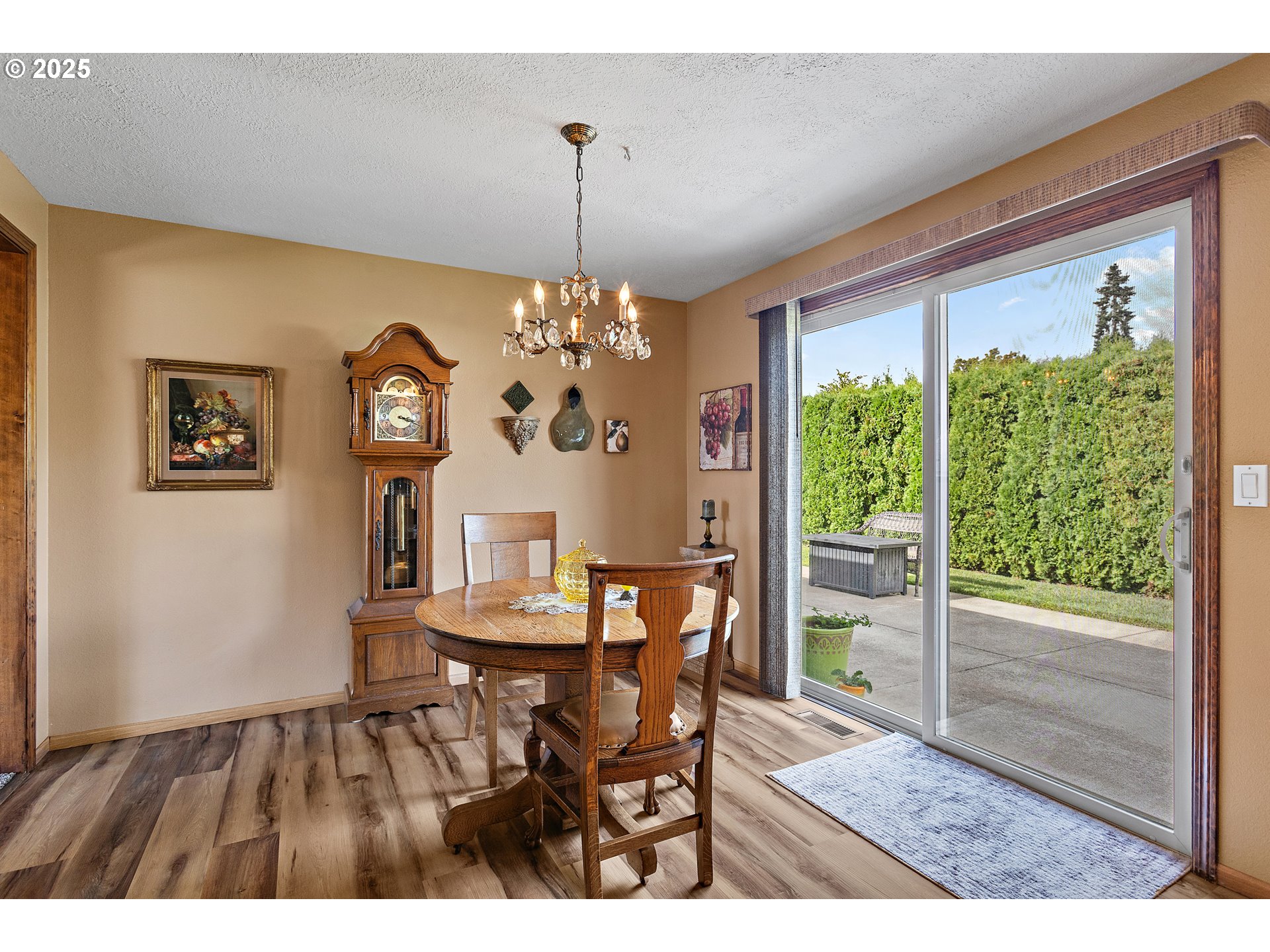 1754 Springtime Court Northeast Keizer, OR 97303 - Photo 8 of 35 a view of a dining room with furniture window and wooden floor