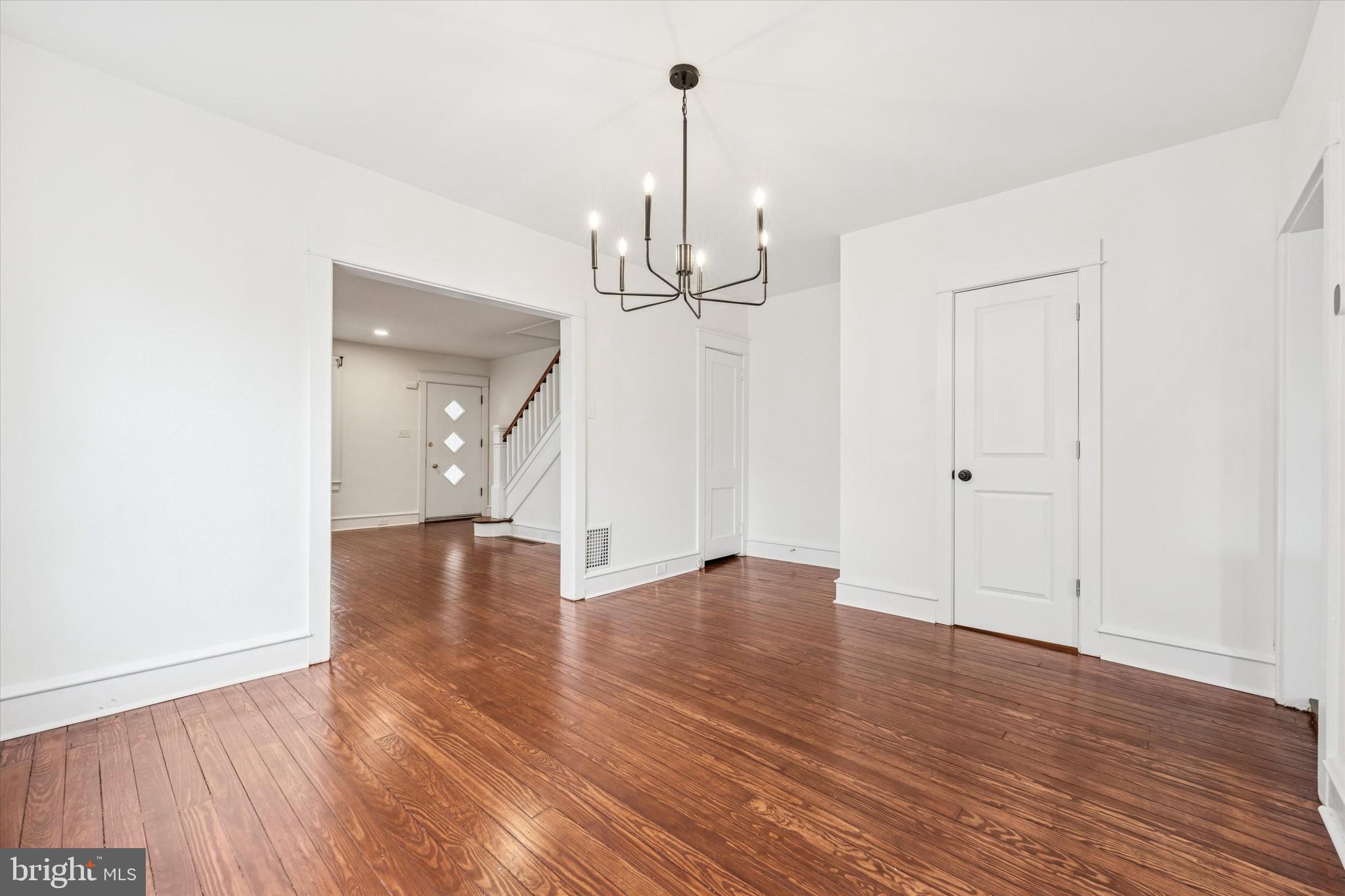 10 West Jefferson Street Media, PA 19063 - Photo 7 of 24 a view of an empty room with wooden floor and a window