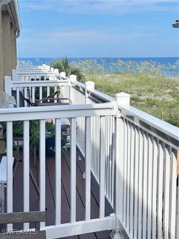 a view of a balcony with city view
